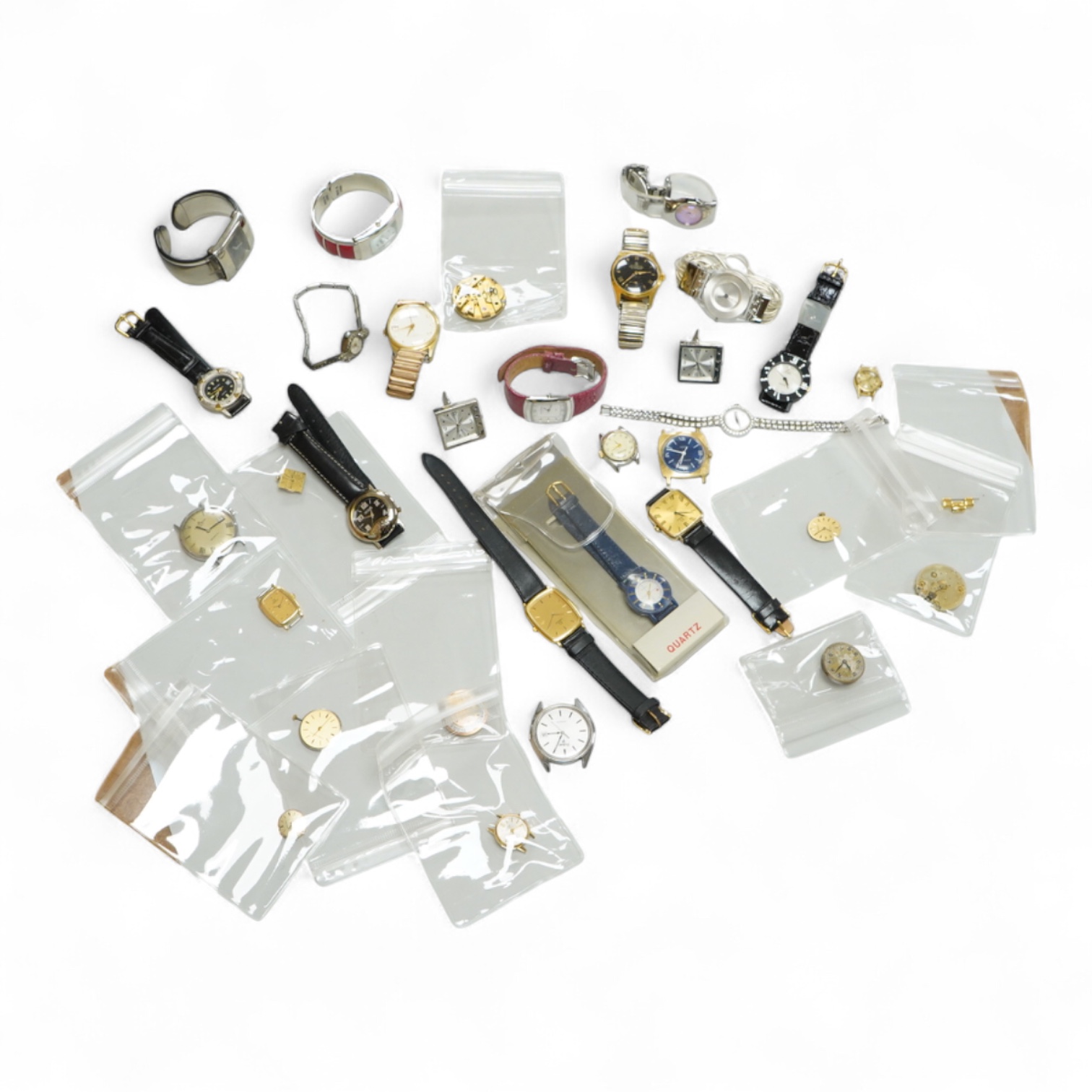 A small collection of assorted lady's and gentleman's wrist watches, including three Omega De Ville steel and gold plated quartz watches and wrist watches movements including Girard Perregaux.